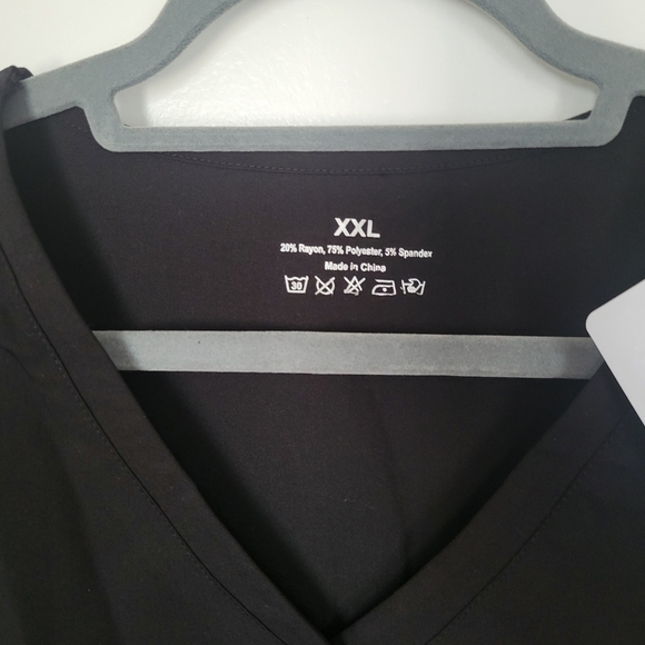 Scrub top in black. NEW with tags. - Picture 4 of 6